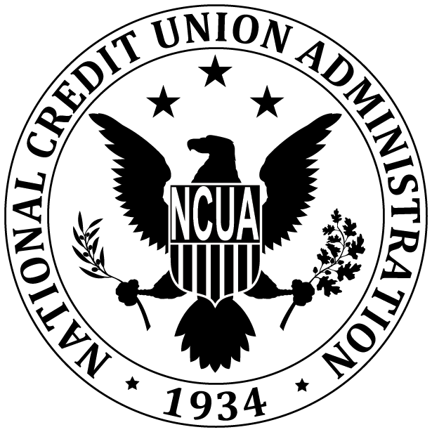 Portrait of a man with glasses wearing a gray shirt.